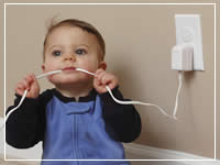 baby chewing on cable